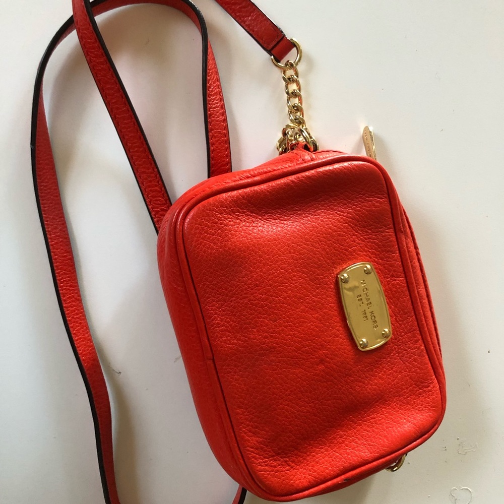 Orange cross body Michael kors bag